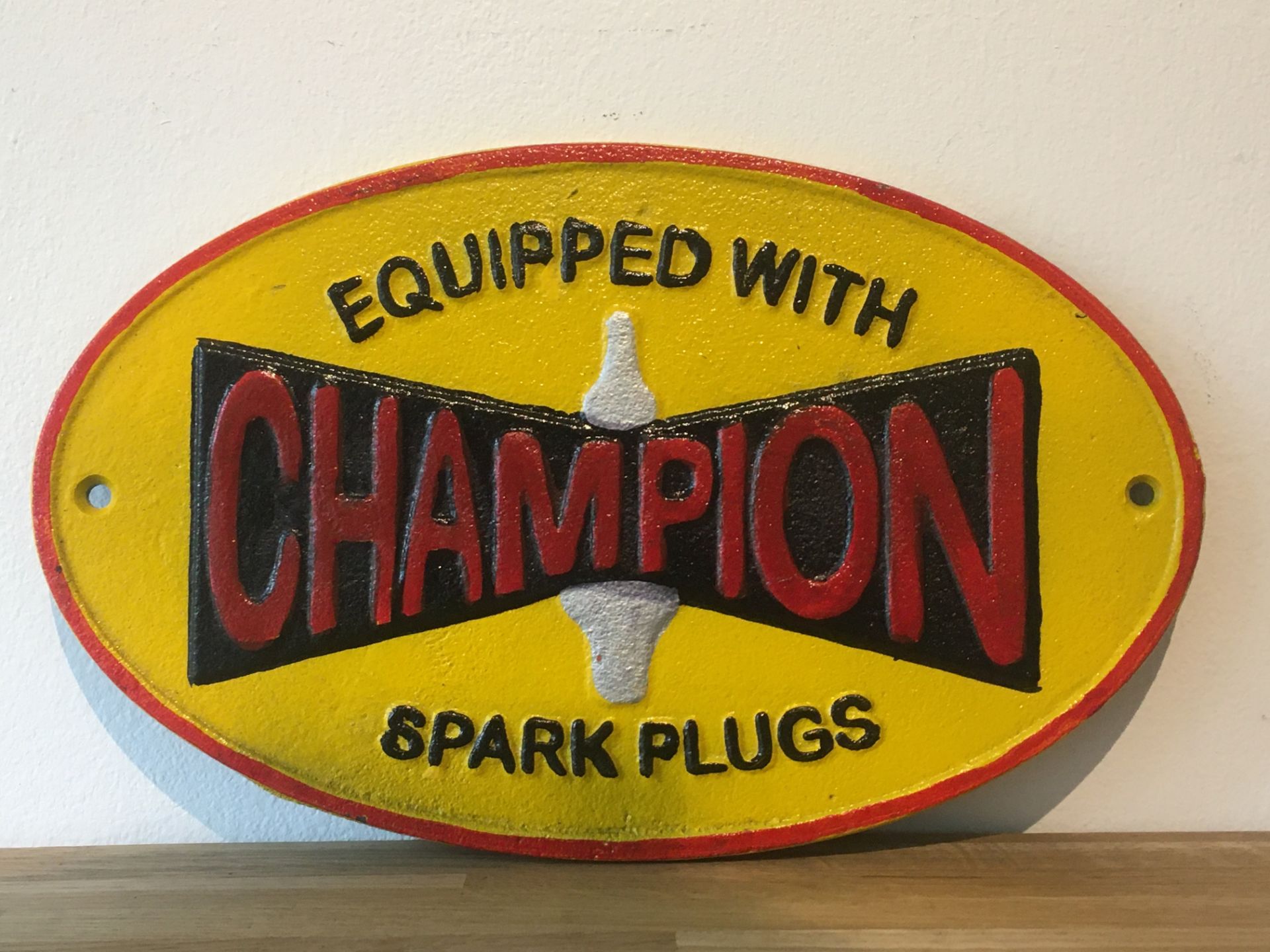 Champion 'Spark Plugs' Cast Iron Sign