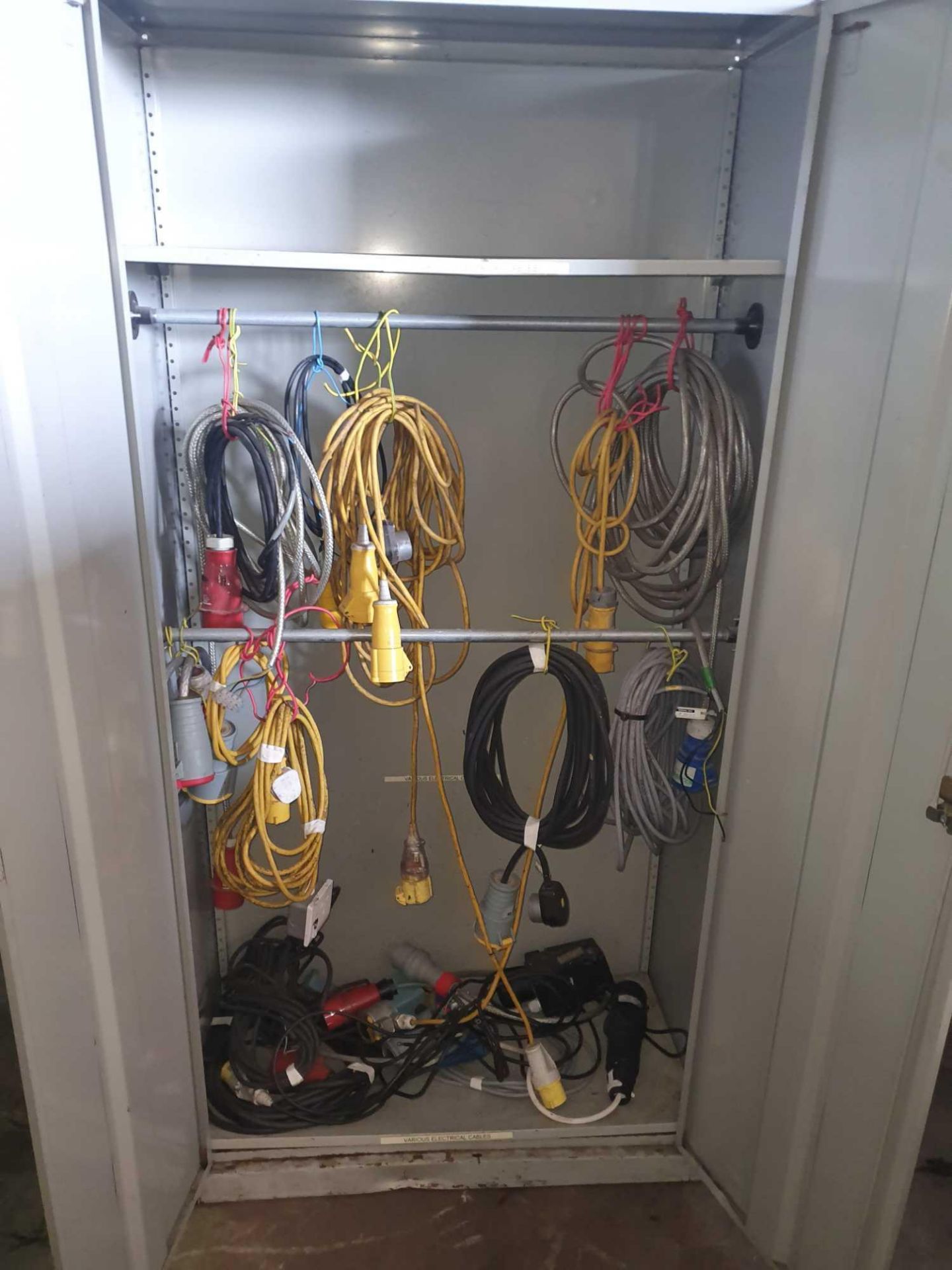 Metal cabinet with contents of variety of part extentions