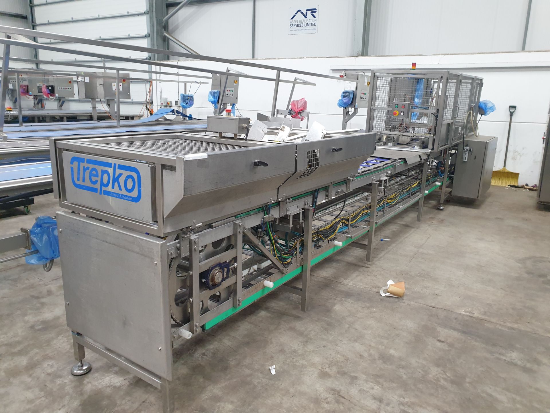 TREPKO Sandwich Triangular Cartoning Machine with Card In-Feed to Dual Lane Manual Sandwich Placemen