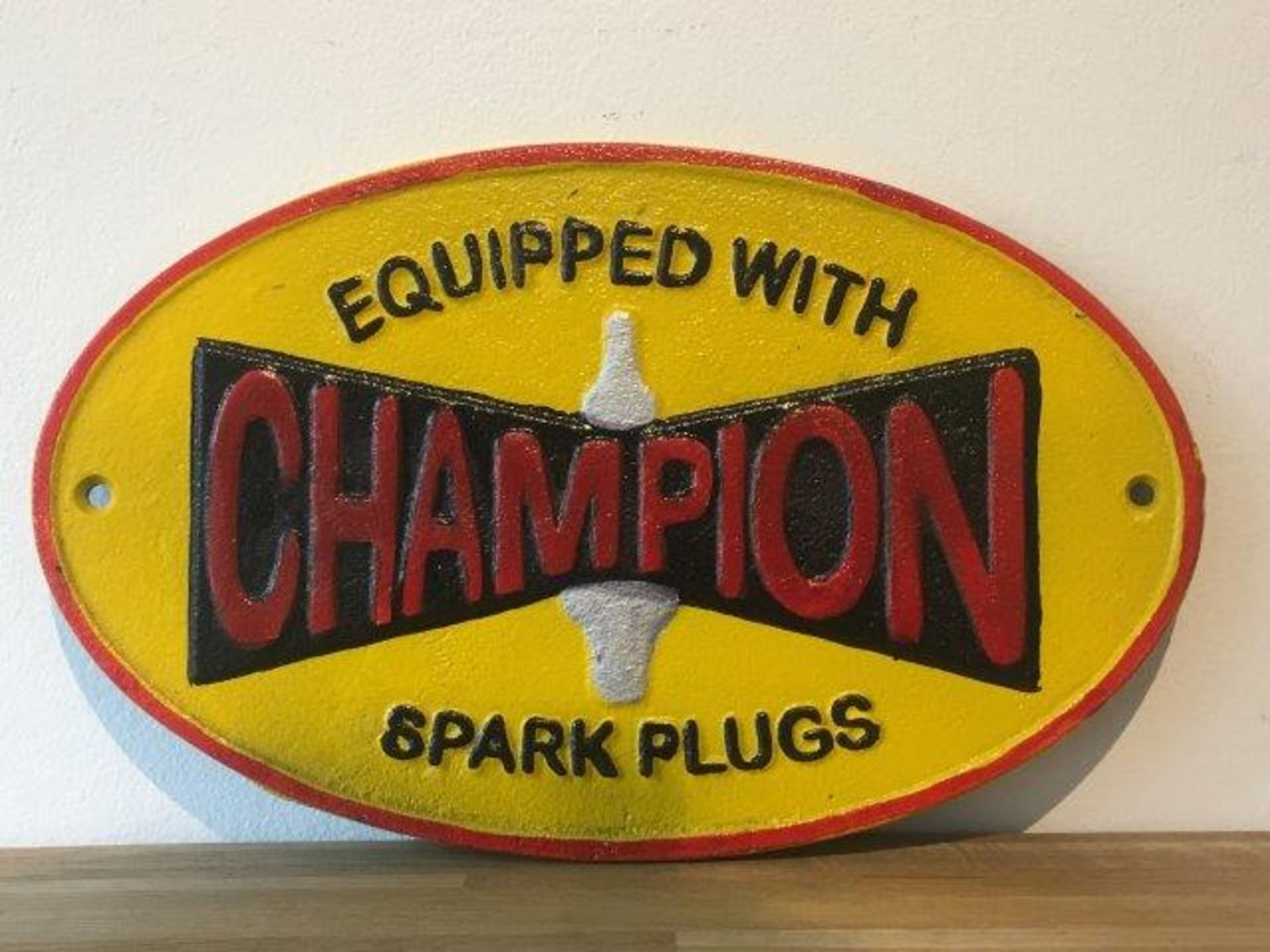 Champion 'Spark Plugs' Cast Iron Sign