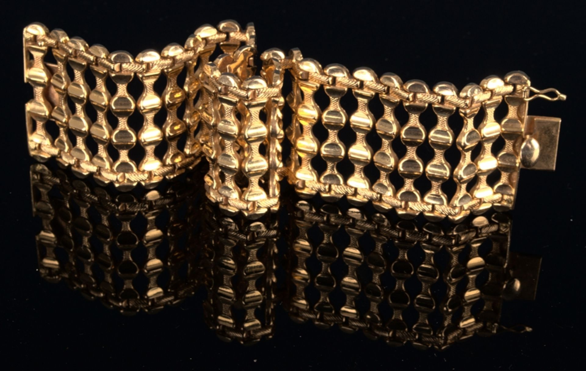 Schweres, sehr breites Gliederarmband, 18 K Gelbgold, Länge ca. 20 cm, Breite ca. 4 cm, ca. 42 gr.