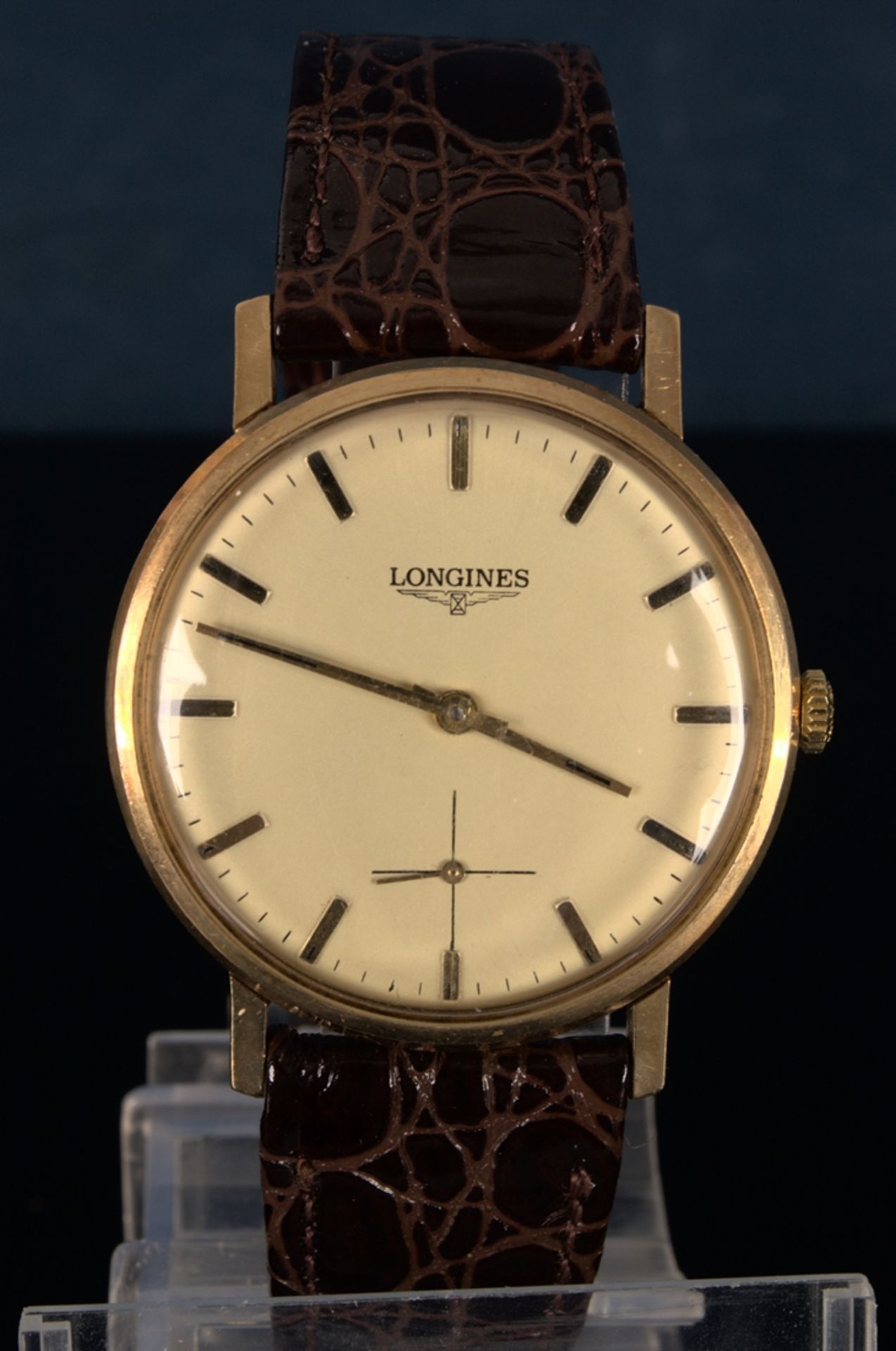 "LONGINES" - Elegante, goldene Herrenarmbanduhr der Marke Longines. Gehäuse in 18 K Gelbgold,