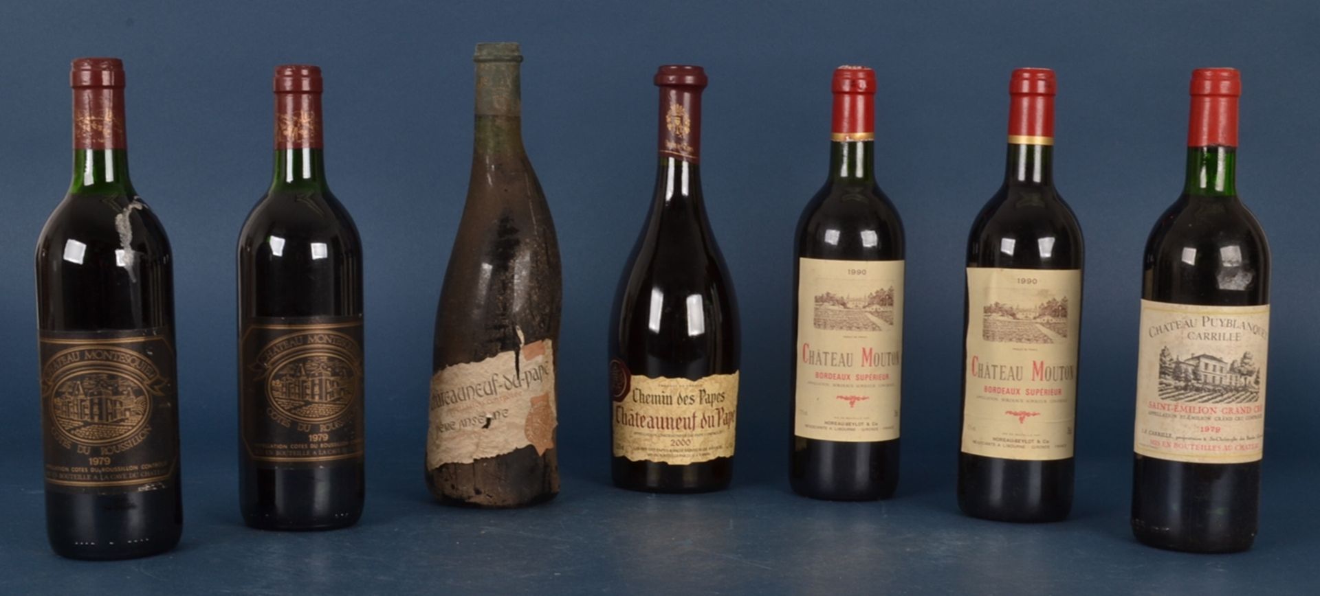 7 französische Flaschen Rotwein: 1x 2000er "Chemin des Papes, Chateauneuf du Pape". 1x 1979er "