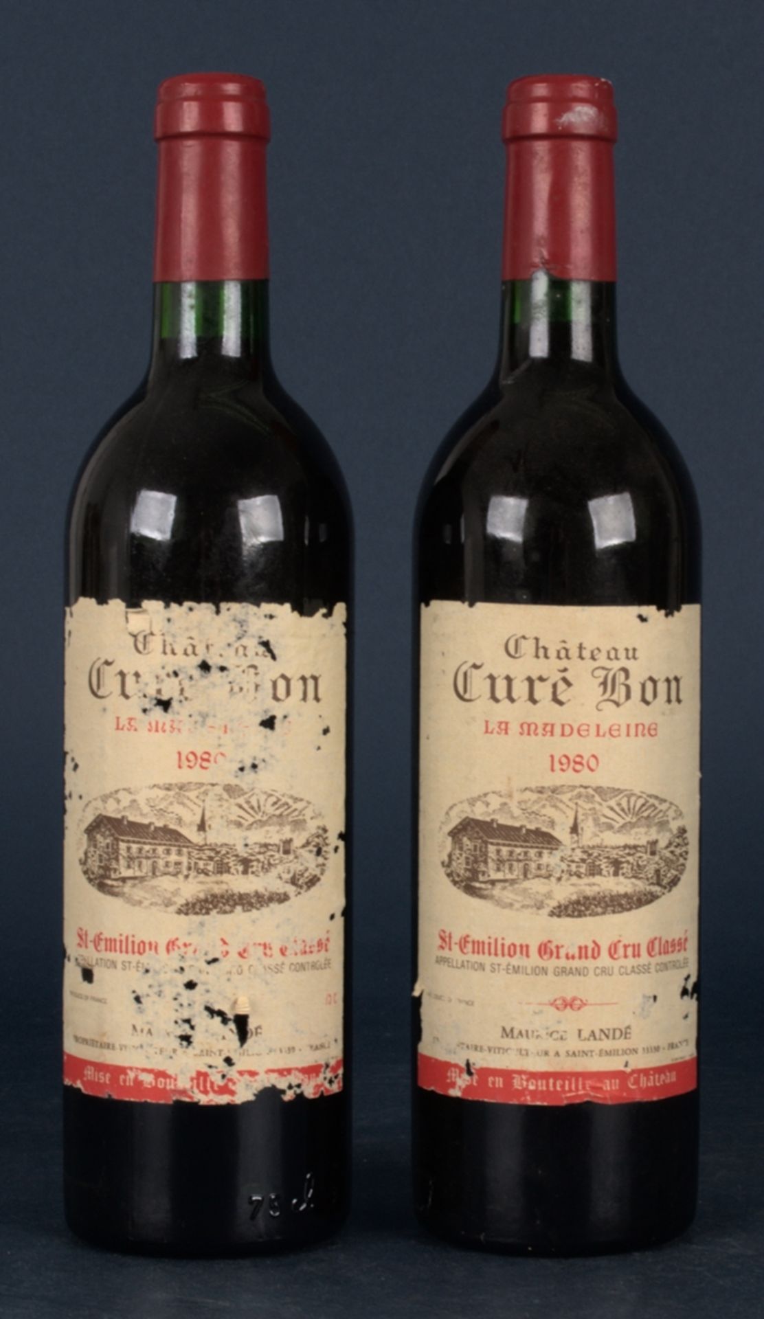 2 Flaschen französ. Rotwein: 1980er "Chateau Cure Bon la Madeleine", Saint Emilion Grand Cru Classe.