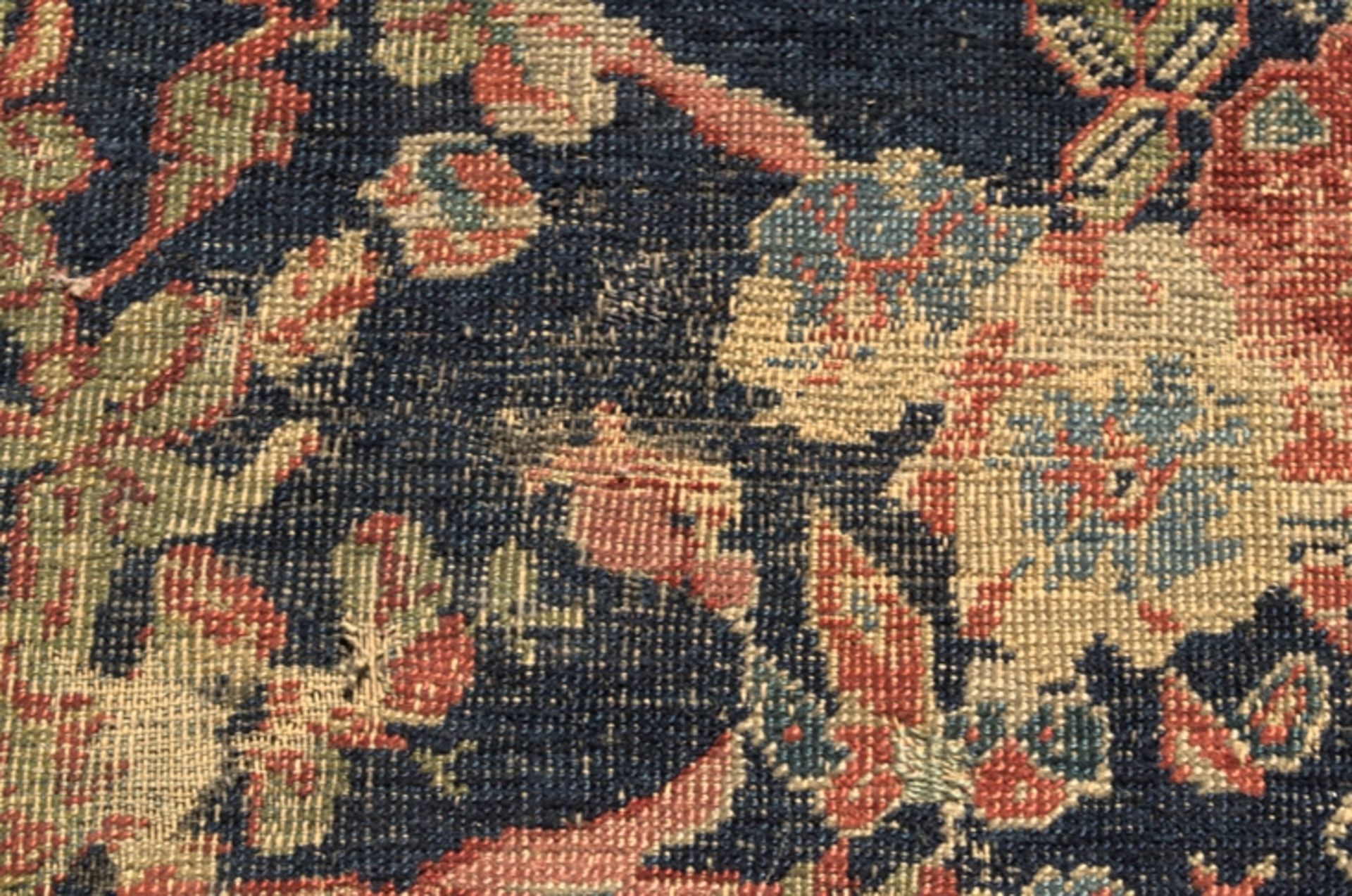 Antiker Teppich, wohl um 1900, dunkelblauer Fond mit floral durchgemustertem Dekor, - Bild 12 aus 13