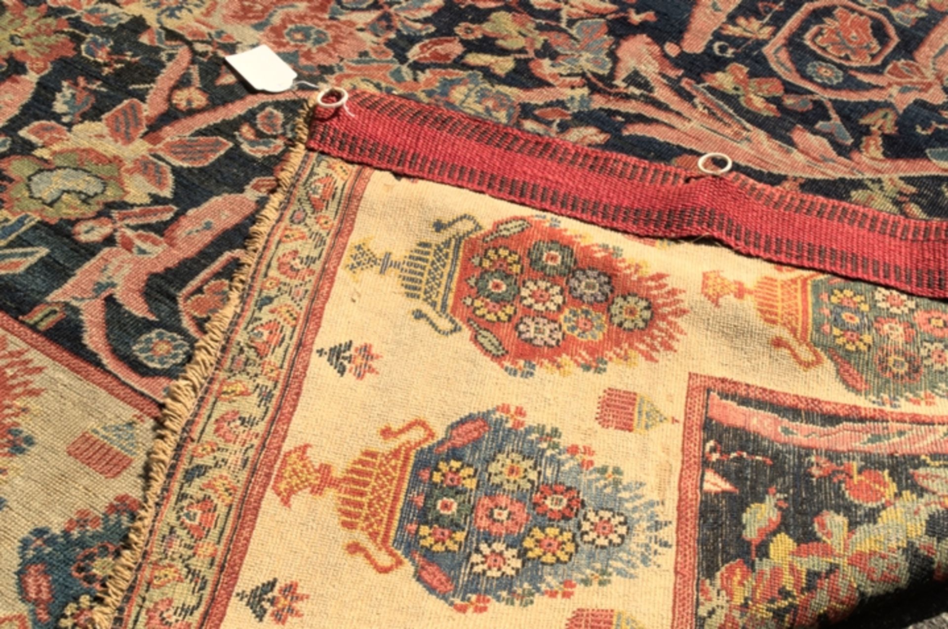 Antiker Teppich, wohl um 1900, dunkelblauer Fond mit floral durchgemustertem Dekor, - Bild 9 aus 13