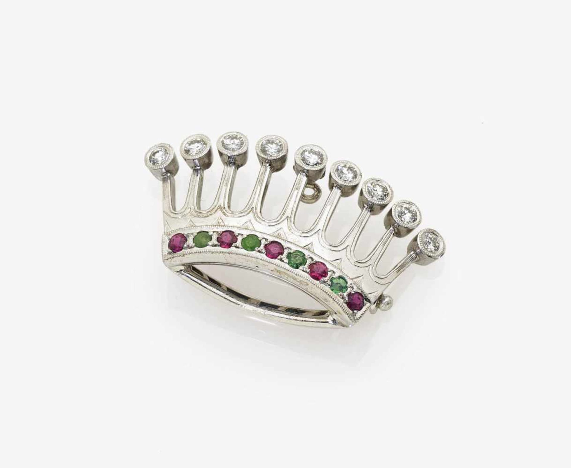 A Diamond, Ruby and Emerald Brooch in the Form of a Crown