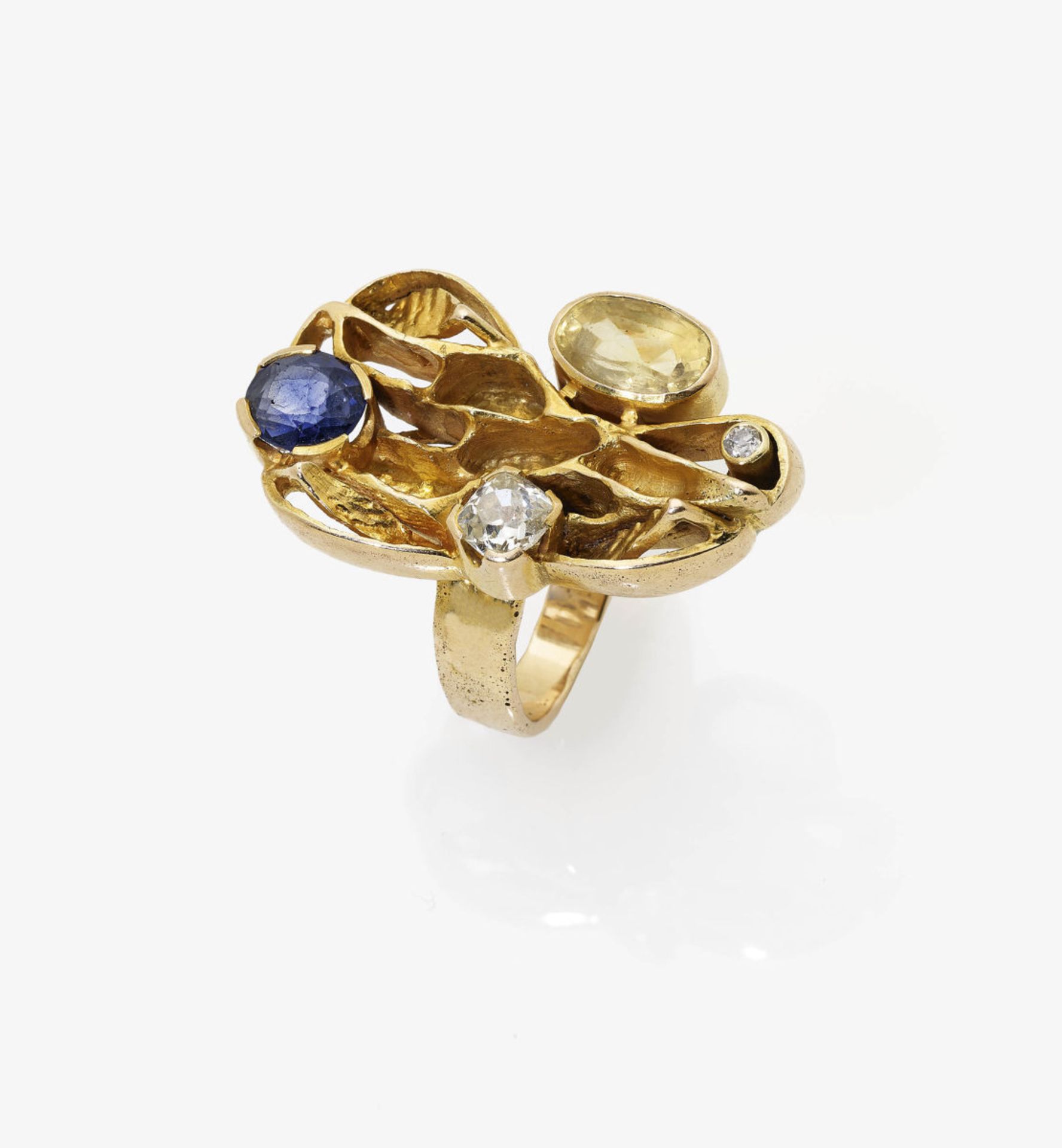 A Citrine, Sapphire and Diamond Ring