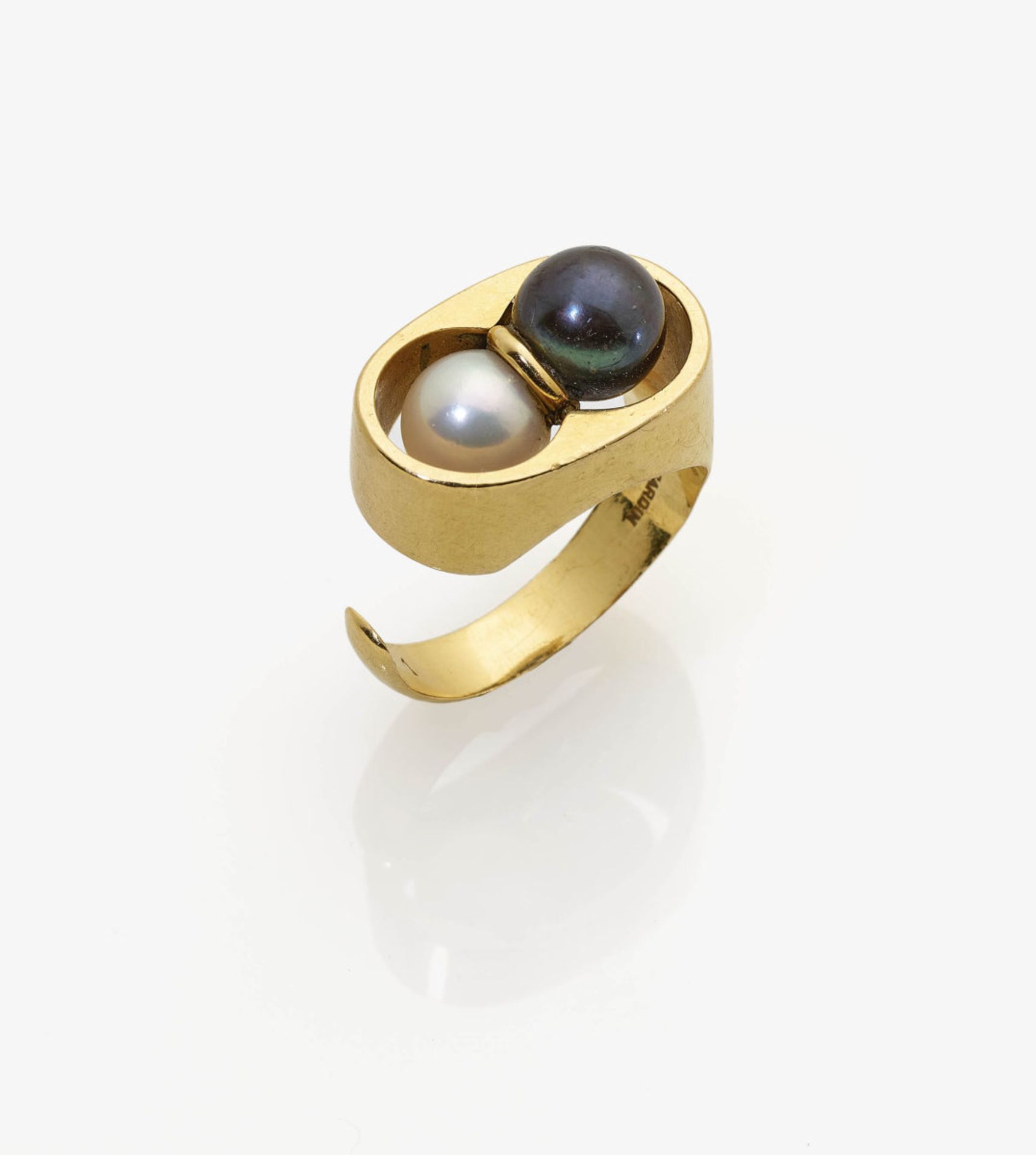 A Ring with White and Black Cultured Pearls