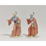 Zwei Chinesenknaben mit Glockenspiel