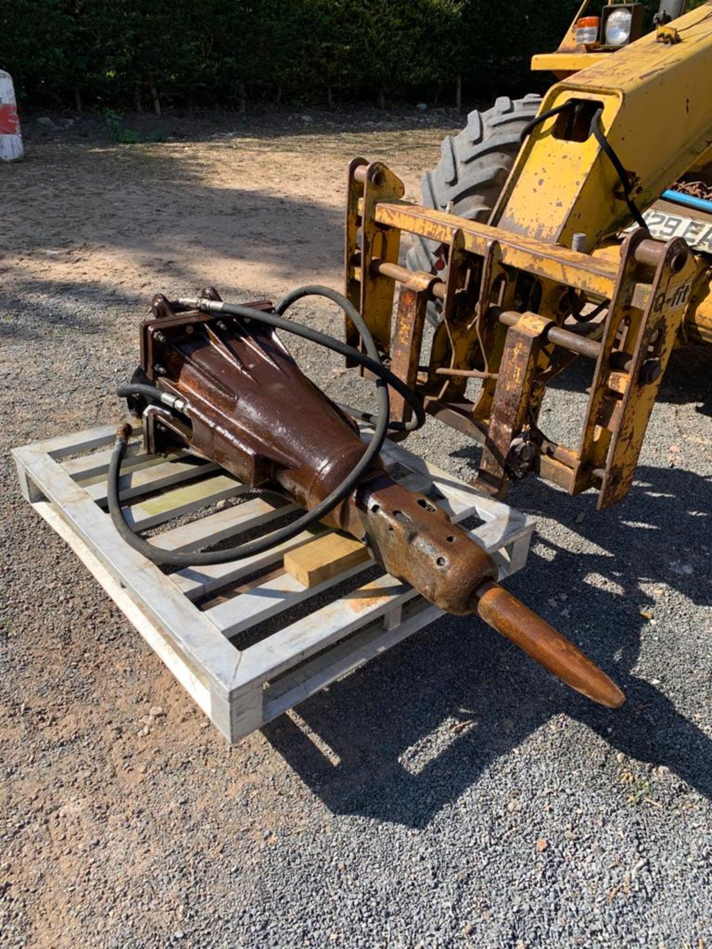 ATLAS COPCO HYDRAULIC BREAKER WAS USED ON CASE 590 SUPER M