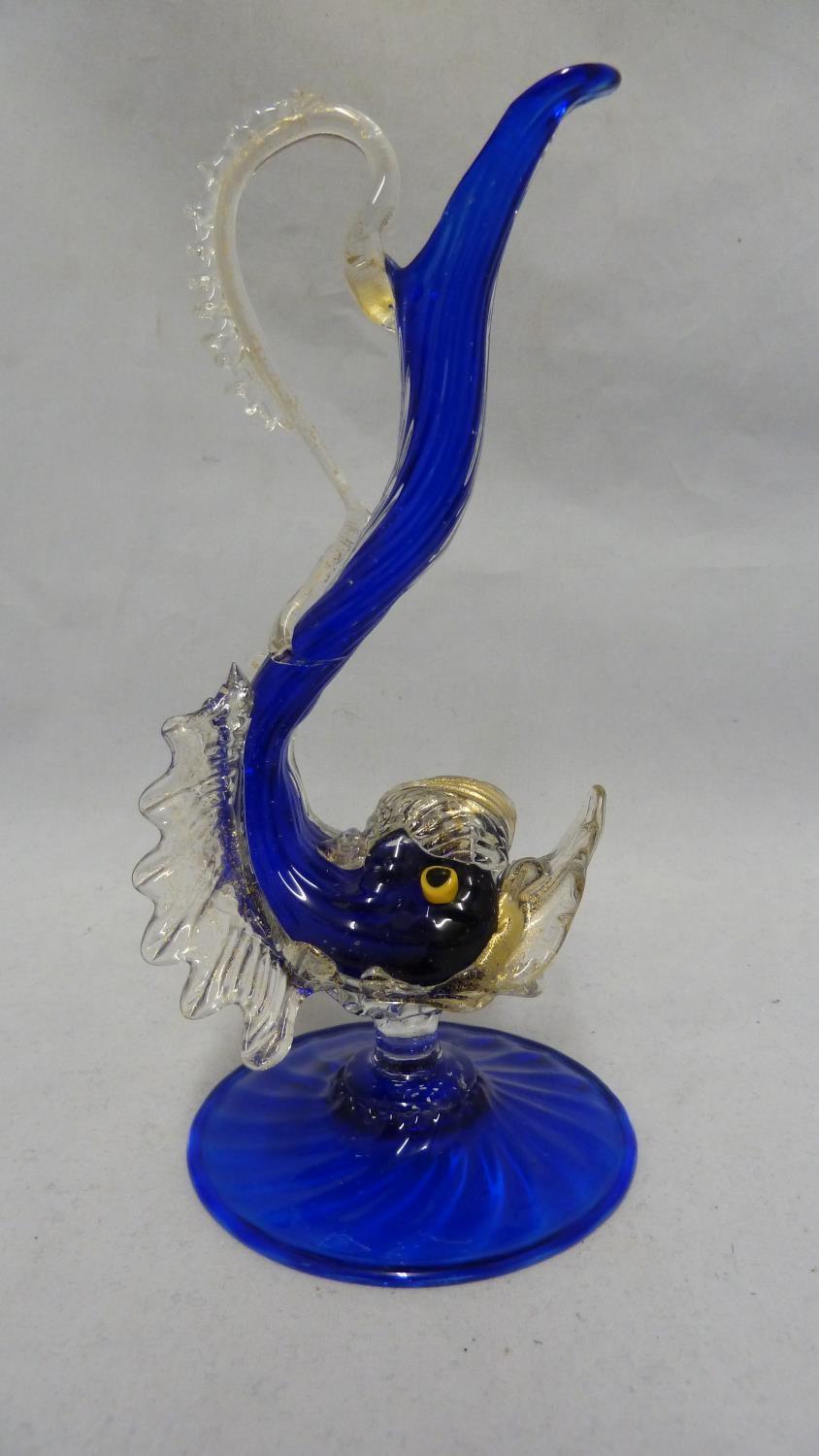 Murano glass - a dolphin form jug, the body of cobalt blue with aventurine gold fins and details,