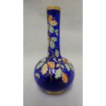 Moser - a cobalt blue bottle vase, enamelled and gilded with oak leaves and branches and acorns,