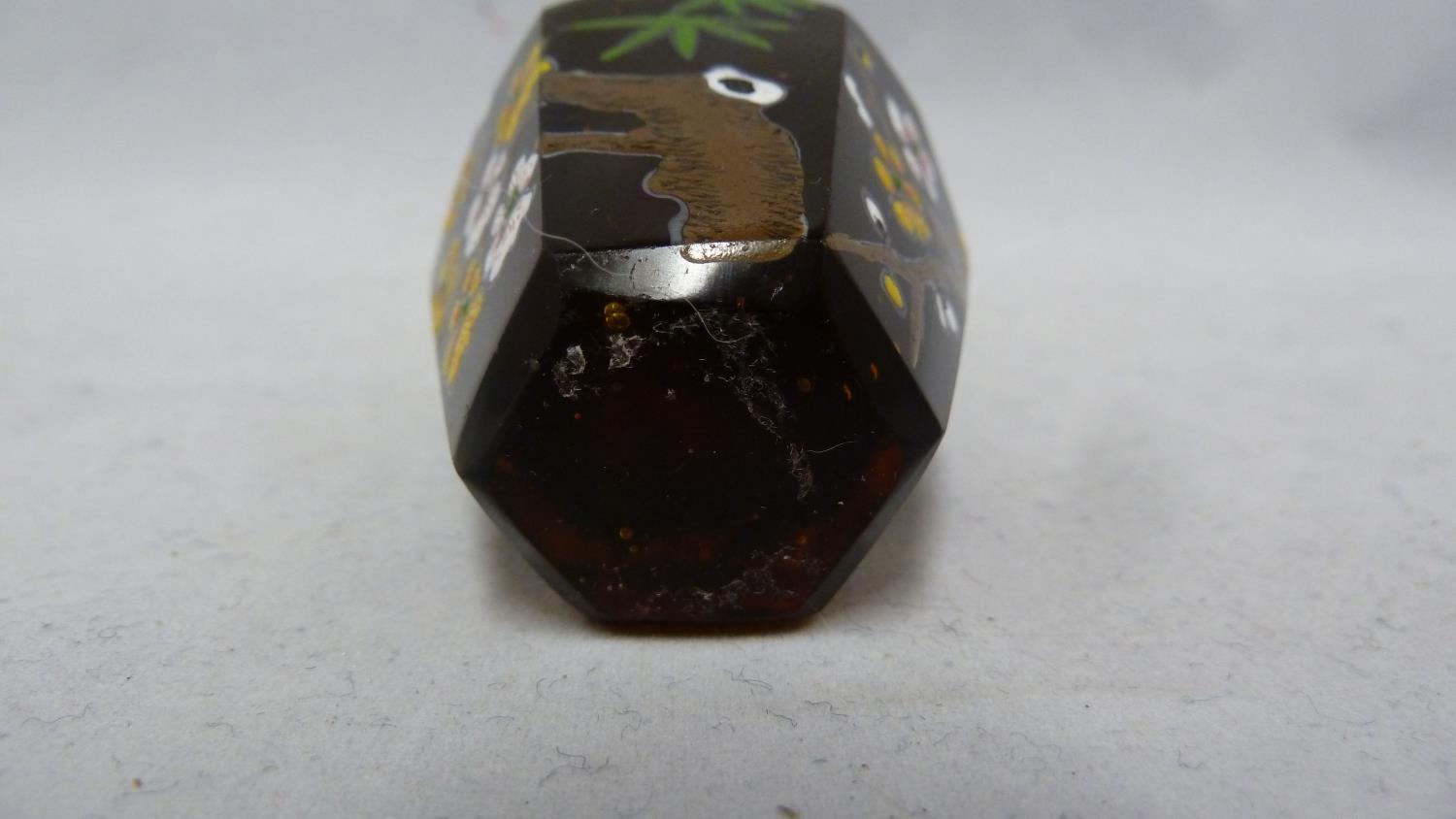 Chinese Glass - a deep amber glass faceted snuff bottle enamelled in polychrome colours with - Image 5 of 5