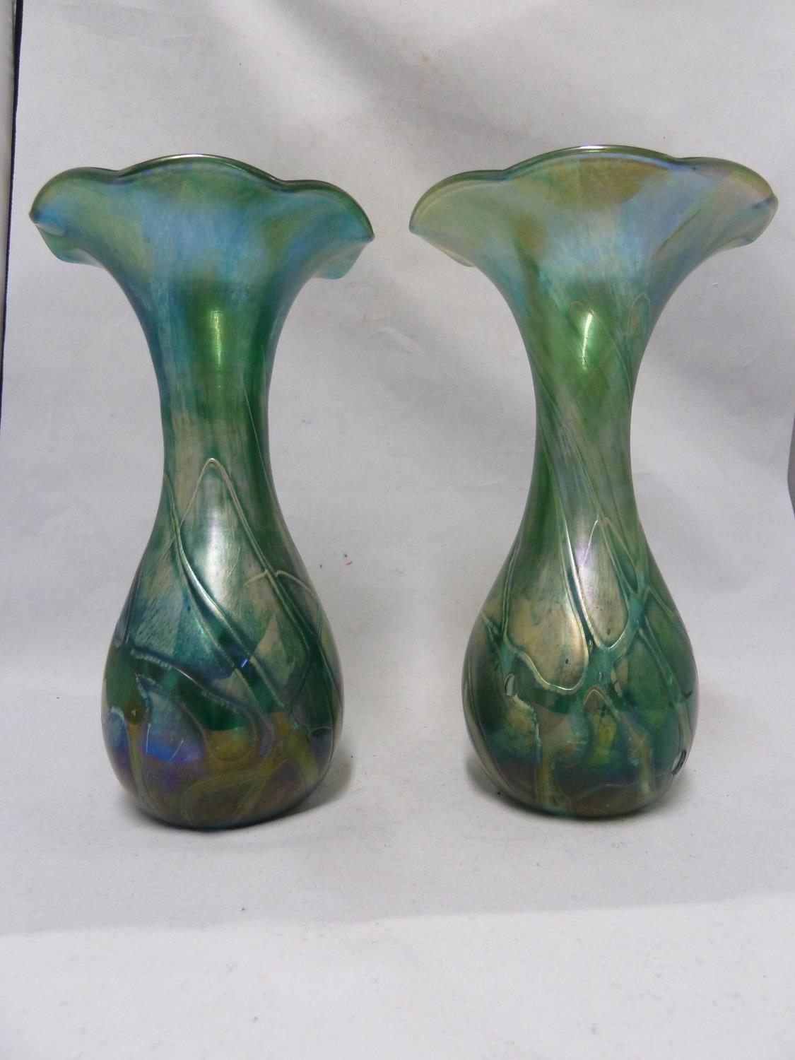 Isle of Wight, possibly Alum Bay - a pair of convolvulus bud form glass vases of nacreous green blue