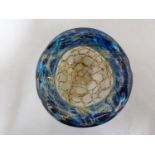 Mdina glass - a bowl with everted rim, the textured blue glass rim folded over a sand and rust