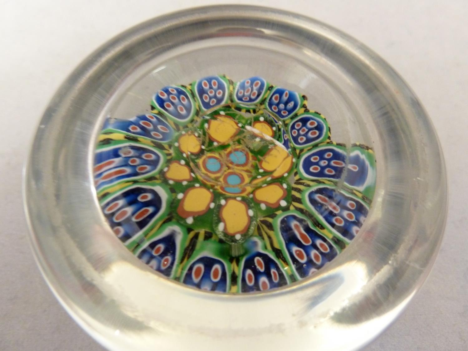 Strathern - a glass paperweight, predominantly of brightly coloured concentric canes in yellow and - Image 2 of 4