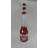 Val St Lambert - a glass decanter, cased in ruby and cut through to colourless with 10 panels of