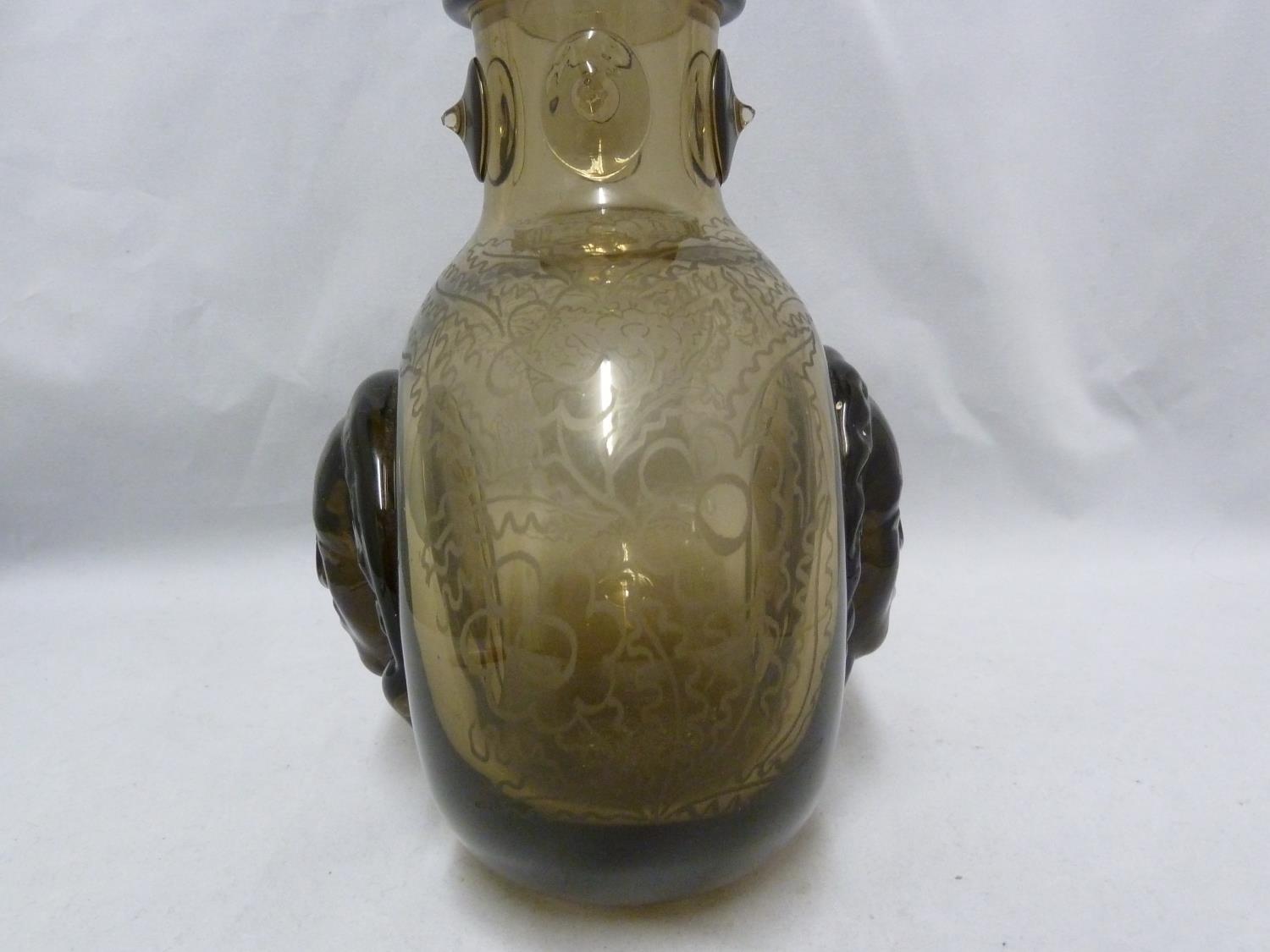 Seguso - a dark amber glass flask, the flattened globular body applied with a female head to each - Image 4 of 8