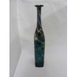 Mdina glass - a large attenuated bottle with random strapping, of amethyst, blue and sand