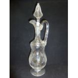Stevens & Williams - a Rock Crystal glass claret jug and stopper, the pear form body with high