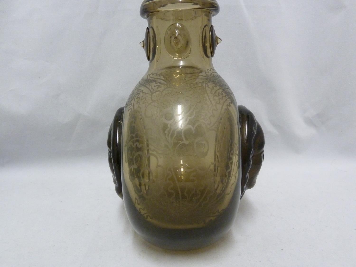 Seguso - a dark amber glass flask, the flattened globular body applied with a female head to each - Image 2 of 8