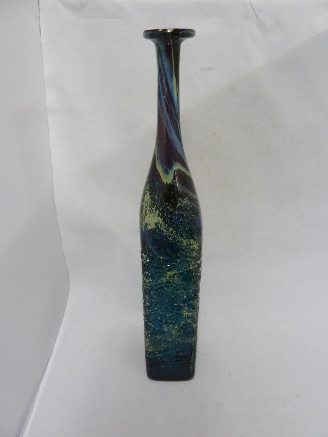 Mdina glass - a large attenuated bottle with random strapping, of amethyst, blue and sand