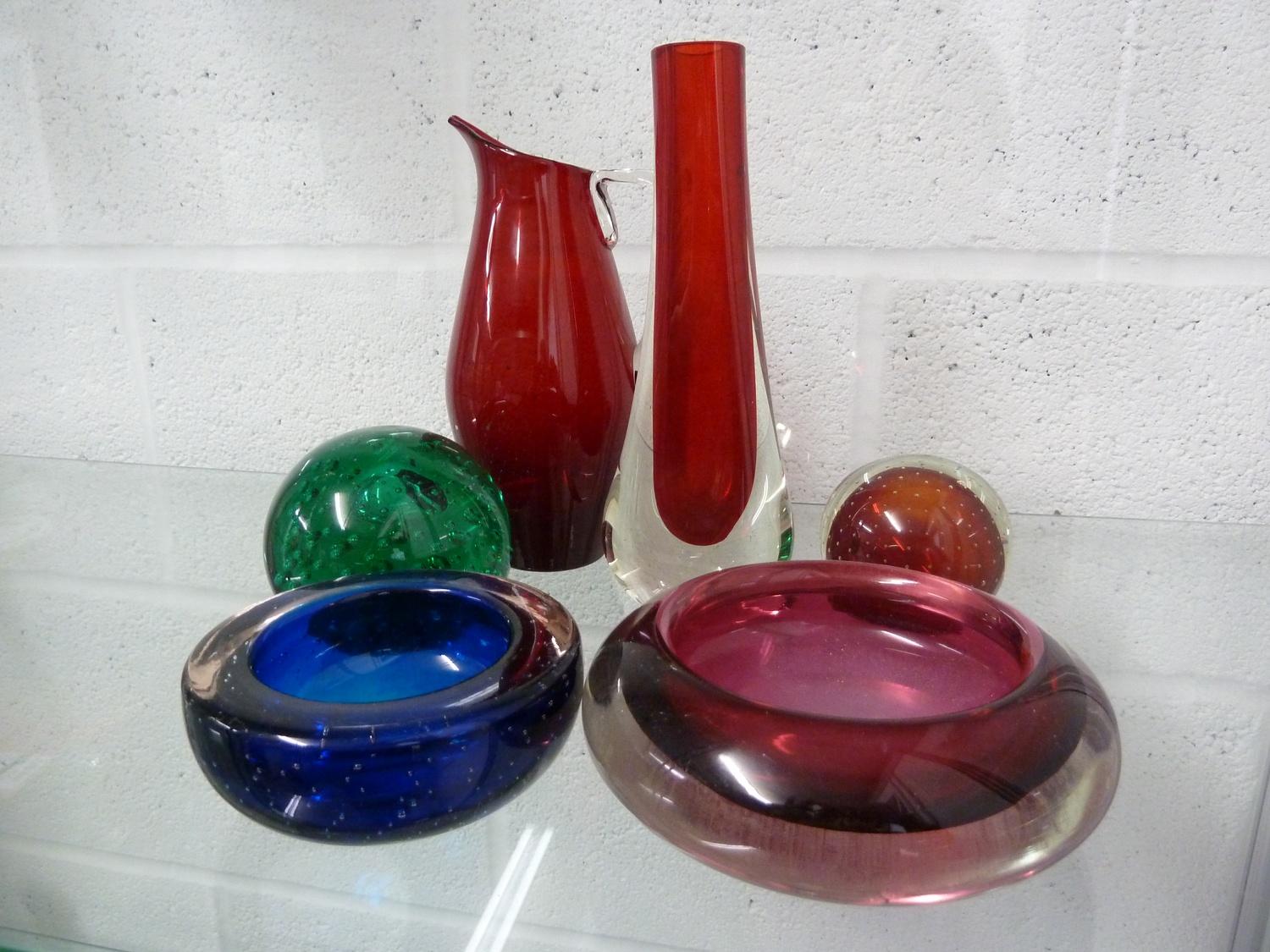 Whitefriars - a 9571 glass vase in cased ruby; a beak jug in ruby; a green controlled bubble