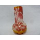 Galle - a fire polished cameo glass bottle vase, of cranberry colour cut through to frosted orange