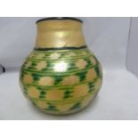 Lundberg Studios (American) - an 'Indian basket with rim' vase, green gold body with black rim and