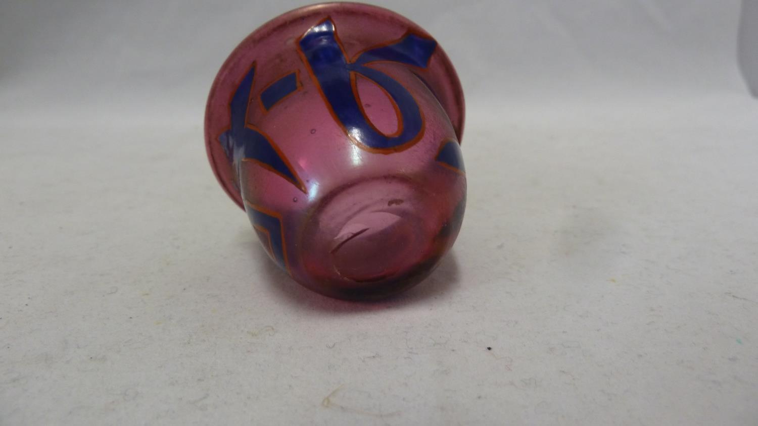Islamic Glass - a wine cup of ruby colour enamelled with blue script characters outlined in red, - Image 4 of 6