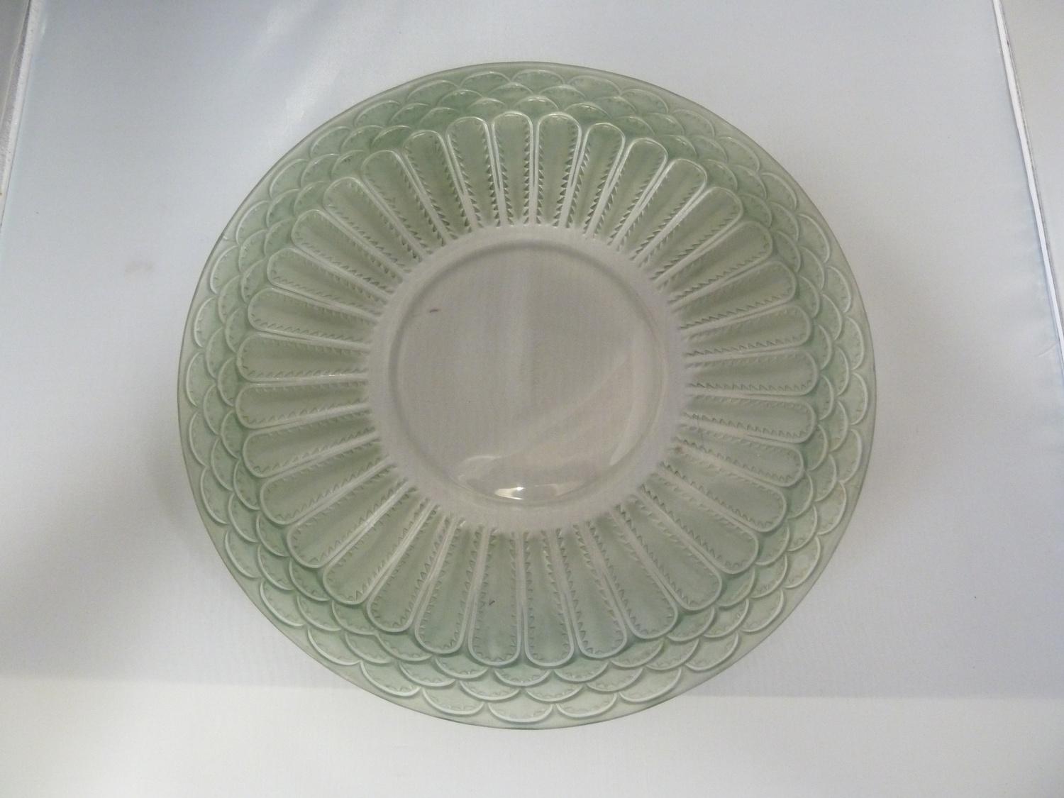 Rene Lalique - a Jaffa pattern charger, green patination, Model No: 3051 Circa 1931, acid etched