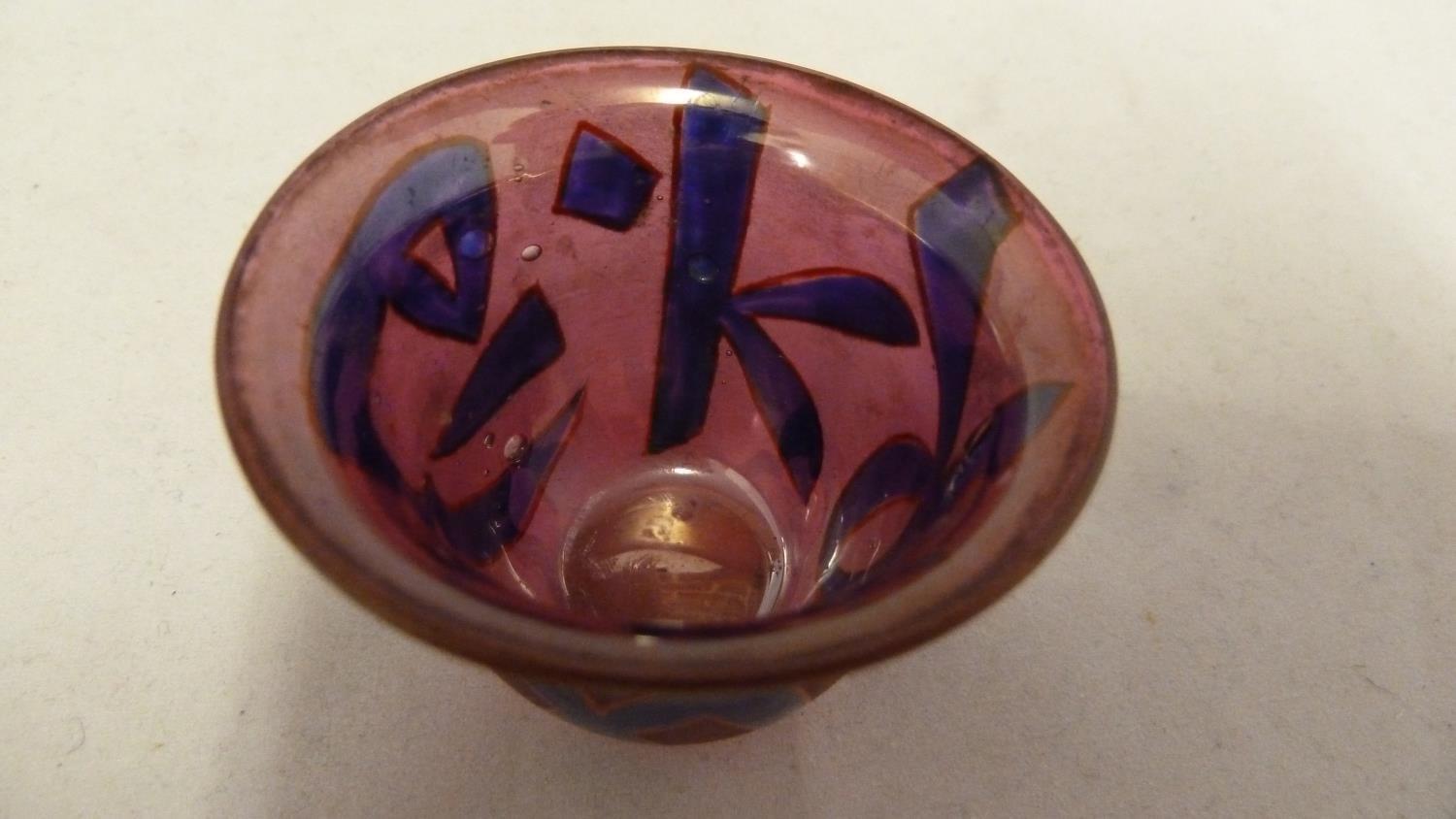 Islamic Glass - a wine cup of ruby colour enamelled with blue script characters outlined in red, - Image 2 of 6