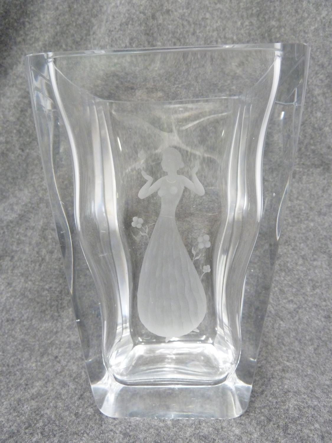 Nils Landberg for Orrefors - a vase engraved with a female figure in ball dress with four petaled