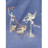 Lamp work figures - a lady charioteer with horses, in colourless glass with orange glass details;