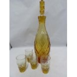 Moser - a dichroic diamond cut decanter and stopper, light change from amber to cherry red; and four