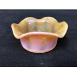 Cristallerie de Pantin - an iridescent opaline glass salt, pink/orange colouration, circular with