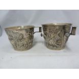 Two reproduction Ancient Greek silver Vaphio cups, of tapered cylindrical form with spool handle,