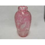 French Glass, possibly Baccarat, an intaglio cut vase of pale cranberry cut to colourless with