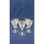 Webb Corbett - five conical cocktail wine glasses of colourless glass, cut with a band of X cuts