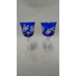 Thomas Webb - two small overlay wine glasses, the cobalt blue cut through to colourless with a