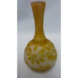 Galle - a cameo glass vase, of mould blown bottle form, the citrus amber cameo cut through with seed