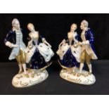 A Pair of Japanese SGK porcelain figures, of gallants and ladies in ball room attire, decorated