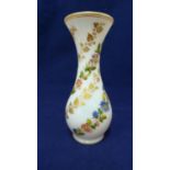 Baccarat - a white opaline glass vase, gilded with vines and enamelled with floral swags, 19th