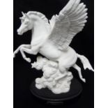 Pegasus - A Royal Doulton figure of a horse with wings atop a cloud with stars, HN3547, together