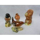 Three Beswick pottery bird figures, comprising Robin, 980, original paper label; Wren 993 and a