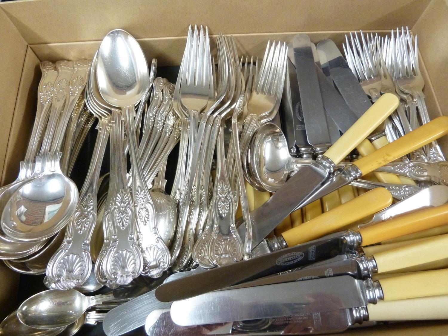 A matched silver plated cutlery service of King's Pattern, comprising: 12 soup spoons, 11 dessert