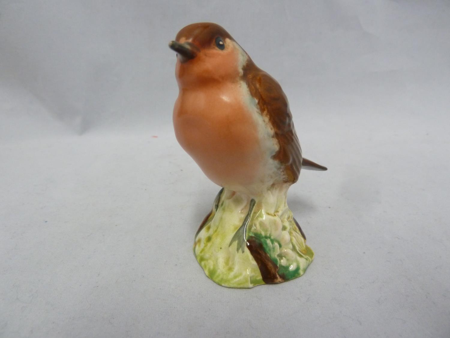 Three Beswick pottery bird figures, comprising Robin, 980, original paper label; Wren 993 and a - Image 6 of 17