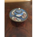 A Continental porcelain Ink stand, decorated in Sevres style with reserve of Summer flowers on a