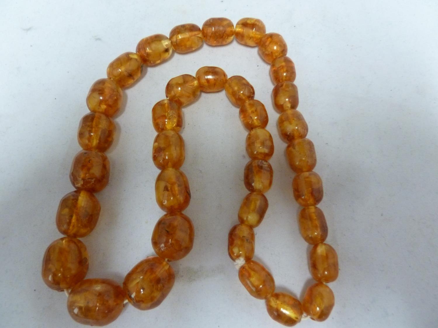 Various items of amber set jewellery comprising: two graduated round bead necklaces with screw - Image 4 of 9